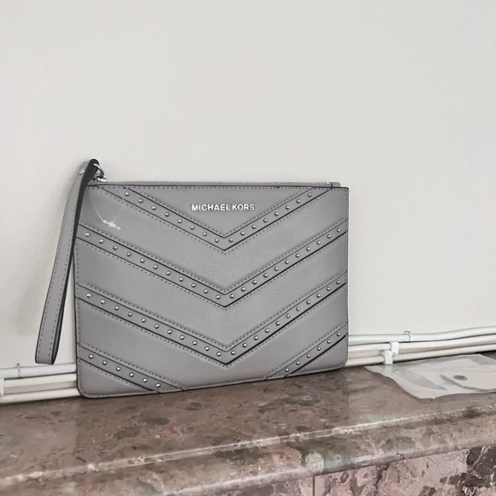 Michael Kors studded wristlet